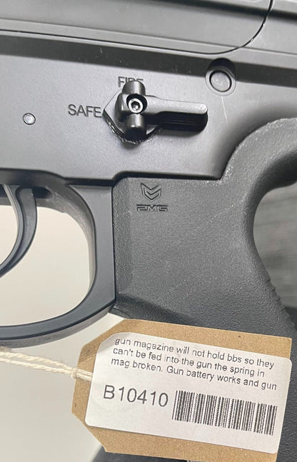 gun magazine will not hold bbs so they can't be fed into the gun the spring in mag broken. Gun battery works and gun fires on auto and semi.